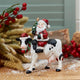 Langs Christmas Santa Riding Cow Resin Ornament