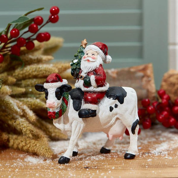 Langs Christmas Santa Riding Cow Resin Ornament