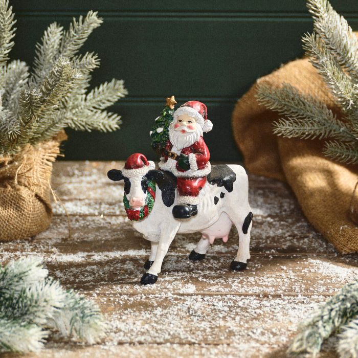 Langs Christmas Santa Riding Cow Resin Ornament